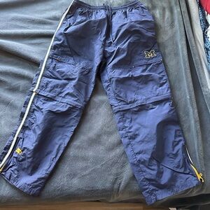 STARTER Michigan zip off warm ups.